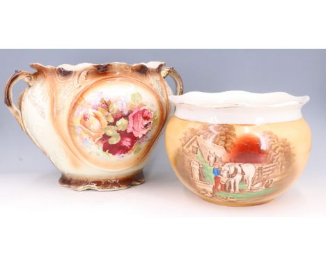 A large late 19th / early 20th Century cachepot together with another by Rubian Art Pottery, former 23 cm