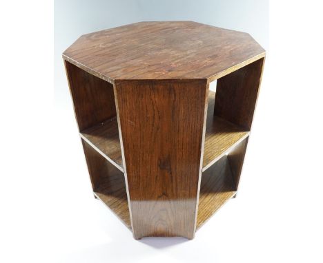 An Art Deco oak occasional table having canted corners and two undershelves,  47.5 (widest) x 50 cm