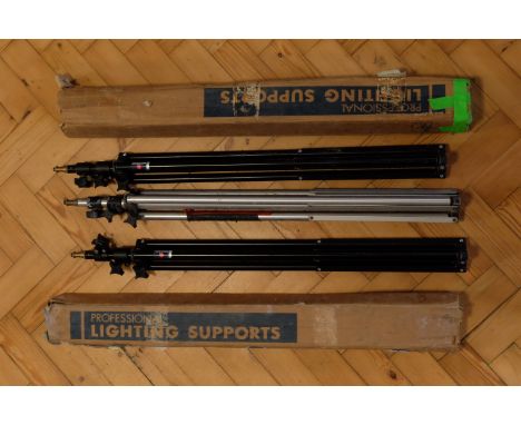 Two boxed Manffrotto "Professional Lighting Support" tripod stands together with another similar, 86 cm
