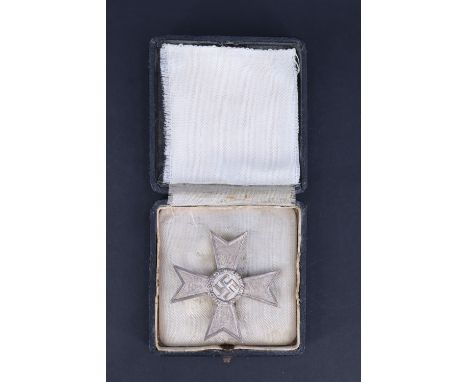 A German Third Reich War Merit Cross, without swords, first class, cased, its pin stamped 4, (Steinhauer &amp; Luck)