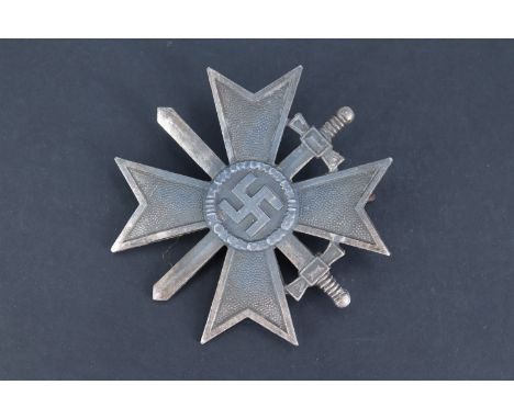 A German Third Reich War Merit Cross with swords, first class, (a/f)