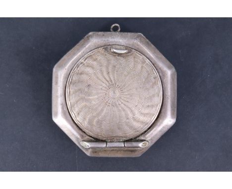 A 1940s silver fob powder compact, of octagonal form, the hinged lid rose engine turned, Henry Williamson Ltd, Birmingham, 19