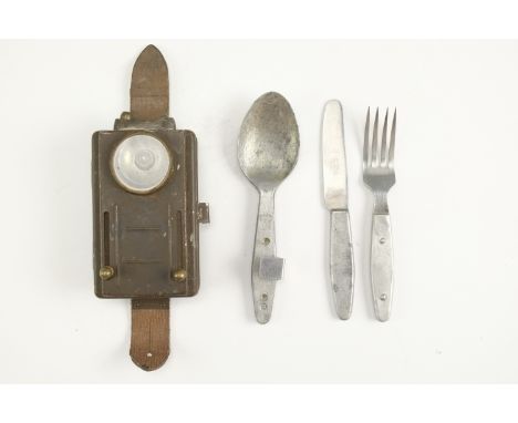 A 1945 British army cutlery combination together with a No 4 Electric Lamp