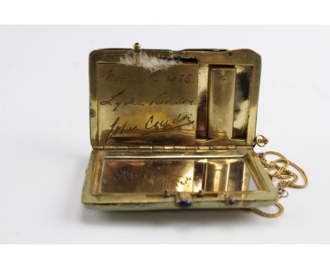 A 1920s faux shagreen and gilt metal powder compact / Minaudière , comprising powder compact, lipstick, mirror, and notelet w