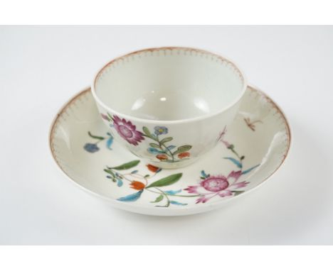 An 18th Century Worcester tea bowl and saucer, in the Harvest pattern having polychrome flowers and butterflies, bowl 7.5 x 4