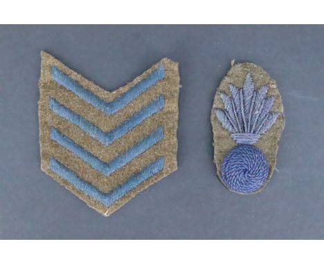 A Great War British army Trench Mortar Gunner's qualification badge together with four War Service chevrons