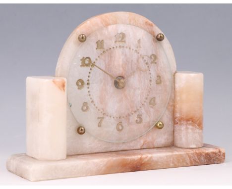 A 1930s Art Deco influenced alabaster mantle clock, having a keyless movement and alabaster dial with engraved and gilt Arabi
