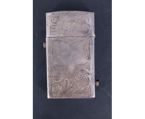 A late 19th / early 20th Century white-metal flip top automatic petrol cigarette lighter, the hinged lid and mechanism being 