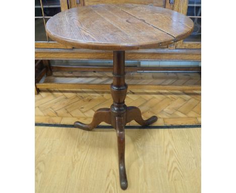 A George III oak tripod table, 57 x 71 cm