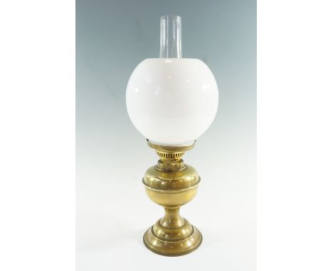 An Eltex brass oil lamp, having a duplex gallery burner, 50 cm