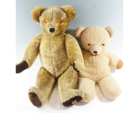 A large early Chad Valley Teddy bear, having glass eyes and articulated joints, together with another similar bear, former ci