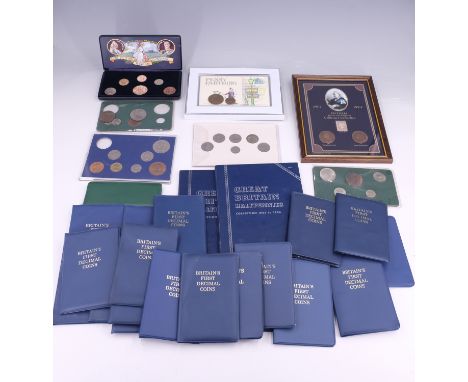 A group of GB and Irish coin packs, including "The British Empire Collection", "Coins of Ireland", and a quantity of "Britain