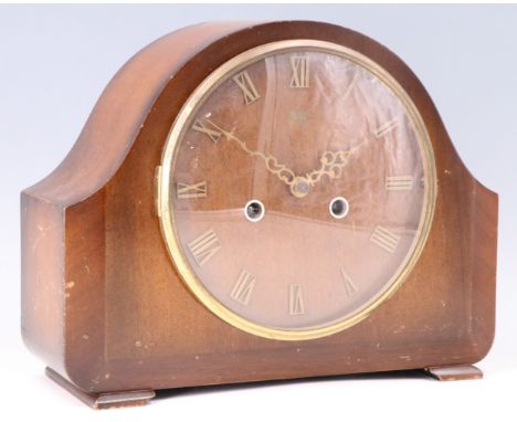 A 1950s mahogany mantle clock, having a Smiths movement striking on a gong, 29 x 12.5 x 23 cm, [running when catalogued, accu
