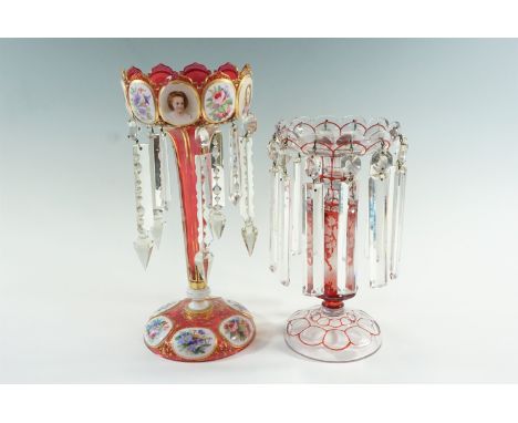 A 19th Century Bohemian style ruby flashed, facet-cut, enamelled and gilt lustre, 32 cm, together with a smaller ruby-flashed