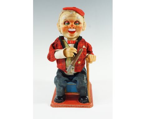 A 1960s Rosko tinplate battery operated automaton toy "McGregor", 30 cm