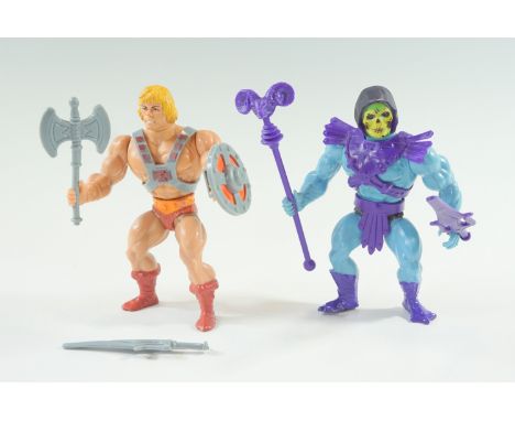Masters Of The Universe action figures He-Man and Skeletor with accessories, by Mattel, 1981, tallest 14 cm