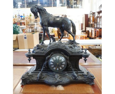 A monumental late 19th Century figural spelter mantle clock, the drum movement striking on a bell, in a renaissance influence