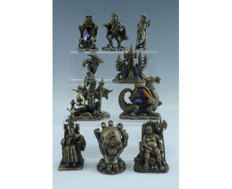 Ten diecast figurines including The Keeper of the Skulls, The Dragon Hunter, King Arthur, Lord of the Rings, The Castle of Li