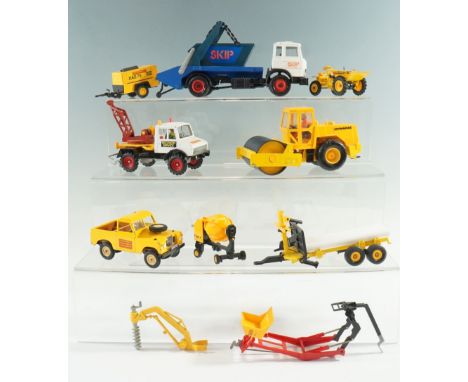 A group of Britains Ltd diecast construction vehicles and accessories, including a skip lorry, a Dynapac roller, etc
