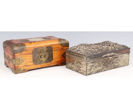 A mid to late 20th Century Japanese brass mounted hardwood jewellery box, the lid having an inset carved jade, together with 