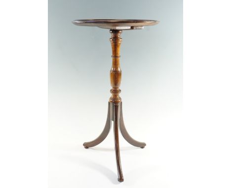 A reproduction diminutive mahogany tripod wine or lamp table, 30 cm x 56 cm 