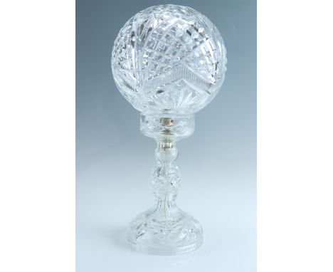 A vintage cut glass table lamp, having a globular shade, 46 cm, (small chips to interior shade and mount)