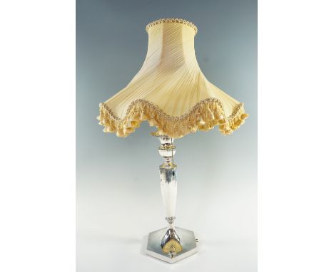 A George V silver table lamp, of hexagonal baluster form on a conforming pedestal base, Sheffield, 1932, weighted, 49 cm to t