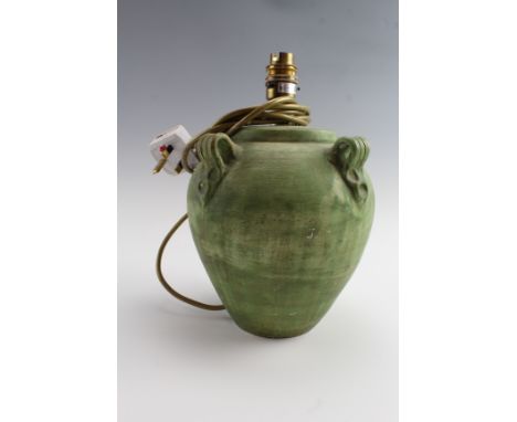 A late 20th Century green glazed oviform ceramic table lamp, 28 cm