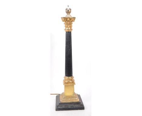 A 20th century Neo-Classical Adams revival style side table lamp. The lamp raised on a stepped square base, with gilt pedesta