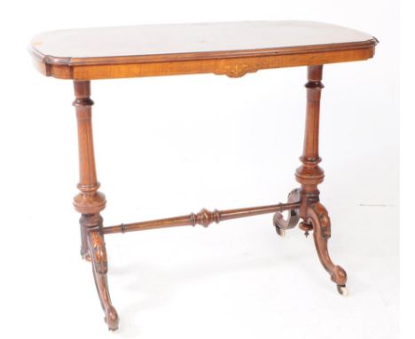 A Victorian 19th century marquetry inlaid walnut writing table. Rectangular form with inlaid border to the figured veneer. Ra