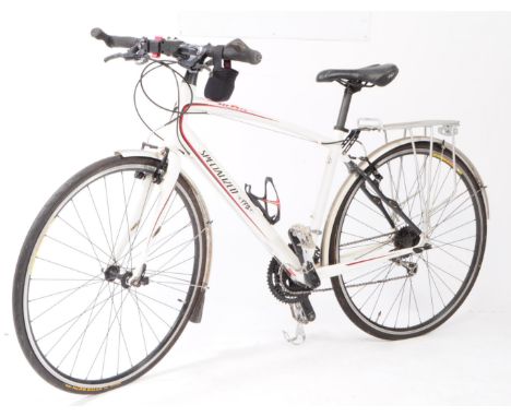 Specialized Sirrus hybrid road bike / bicycle in white colourway. Complete with pannier rack to rear.100x165cm approx