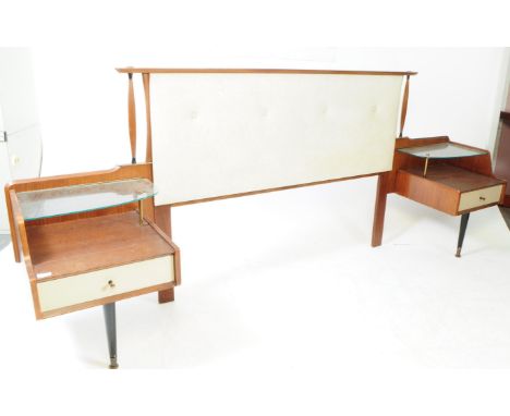 Beautility Furniture - A mid 20th century Beautility double bed headboard. The headboard having a large off white fabric upho