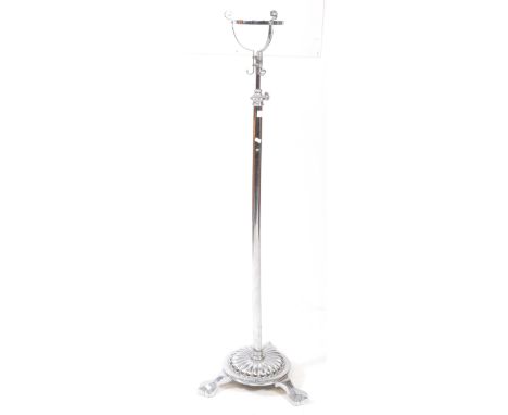 A mid century retro chrome floor standard lamp. The bulbous top with fitting raised on column body, over circular base with t