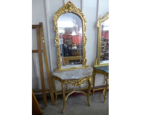 A reproduction French Louis XV style gilt console table and mirror