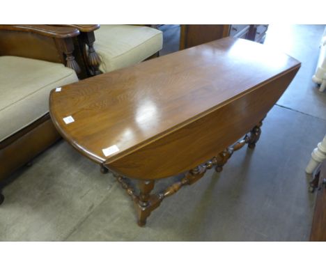 An Ercol drop-leaf coffee table