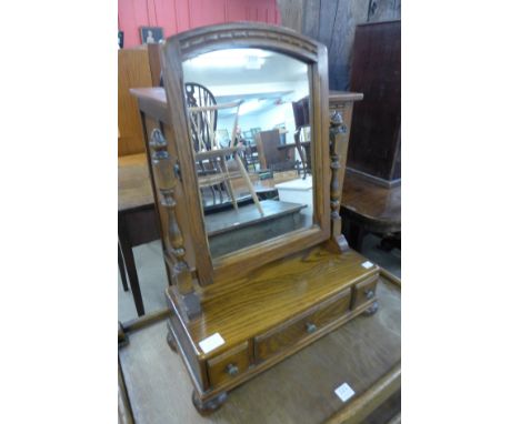 An oak toilet mirror