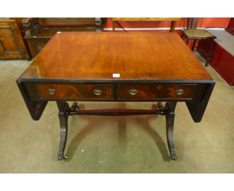 A George IV inlaid mahogany sofa table