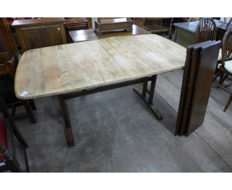 An Ercol extending refectory table