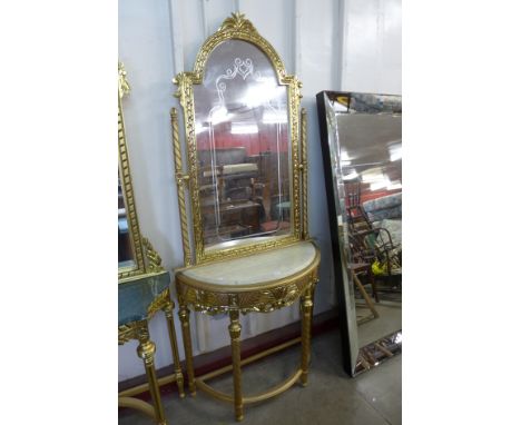 A reproduction French Louis XV style gilt console table and mirror