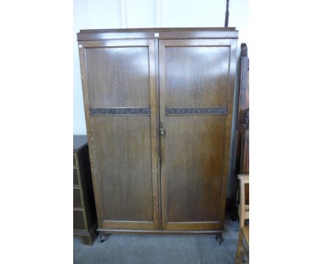 An oak two door wardrobe