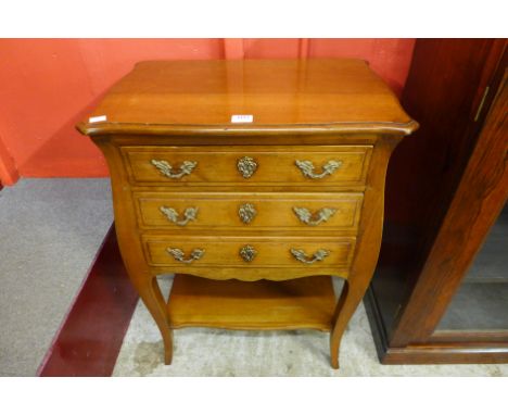 A French style fruitwood petit commode
