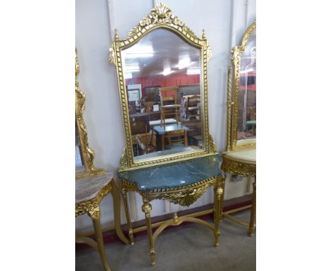 A reproduction French Louis XV style gilt console table and mirror