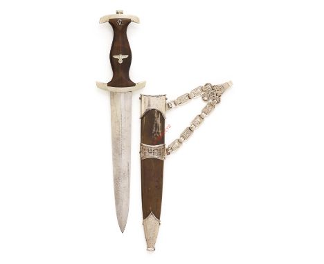 German Third Reich SS Model 1936 chained dagger. A scarce, correctly unmarked, example.  The double edged blade bears etched 