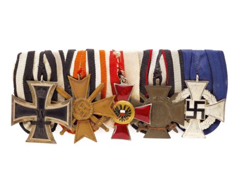German Imperial and Third Reich Iron Cross group of five medals. A fine scarce group mounted as worn in the Germanic style. 1