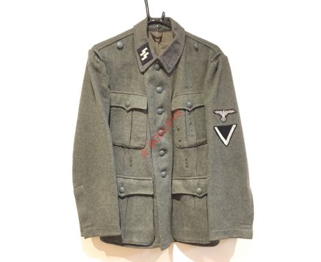 German Third Reich Waffen SS field grey tunic. A good clean example of the four pleated pocket, six button fronted army issue