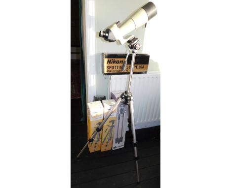 A Nikon spotting scope, with Sherpa 250 tripod and three other tripods.