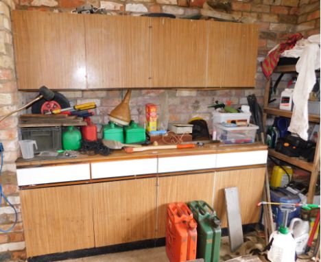 A range of Hygena cabinets and contents, being tools, sundries, etc. and contents of staging rack in the corner run of tools 