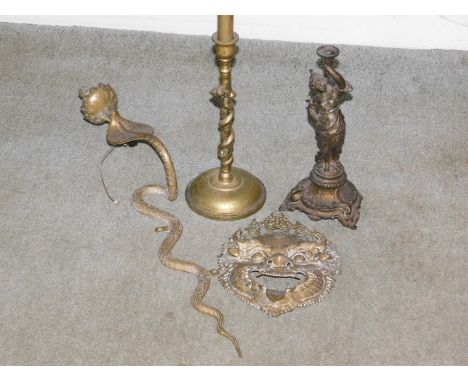 An Oriental brass model face mask, ornamental brass cobra wall light fitting, etc.  (4)
