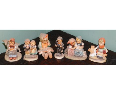 Five Goebel Hummel figures, and another. (6) 