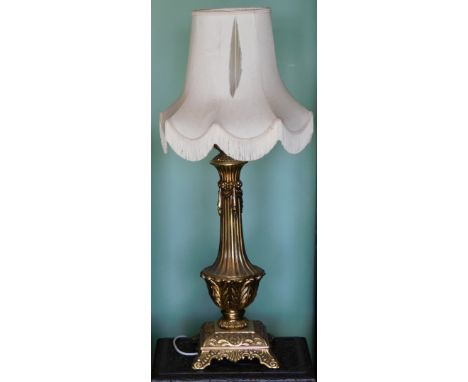 A brass table lamp of Neo Classical design, 54cm high, and shade. 